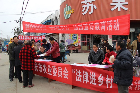 明光市农委认真开展“法治宣传进乡村”活动1.jpg
