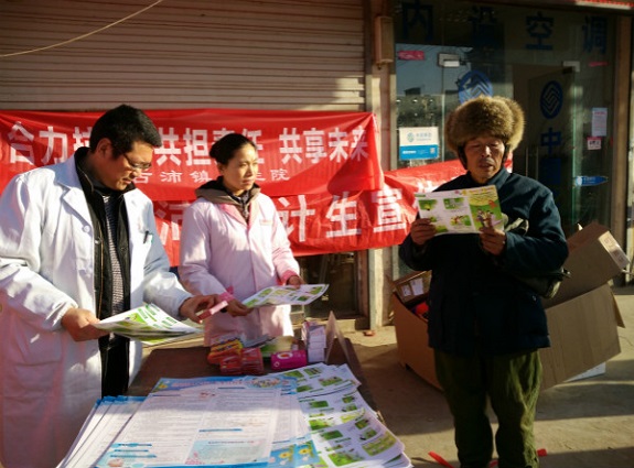 古沛镇开展法制、计生、防艾滋宣传活动.jpg