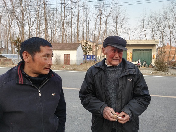 明光市救助站助失散多年的父子重聚.jpg
